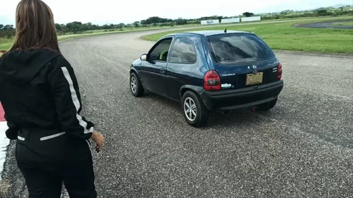 Miaisbeth cranking and starting her Chevy Corsa