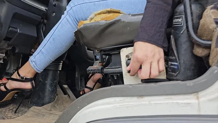 Katherine pedal pumping and driving a huge truck on sexy black heels