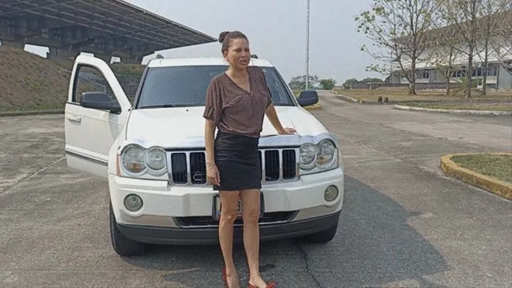 Katherine driving and pedal pumping the Grand Cherokee on sexy red pumps