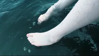 Giantess Cali splashes in a lake