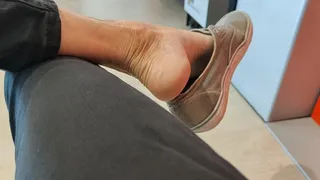 Worn shoes heelpopping in the waiting room