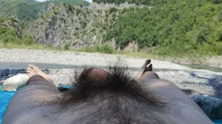 Naked on a public beach - cock tease and worn feet