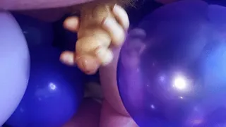 Stroking cock with balloons