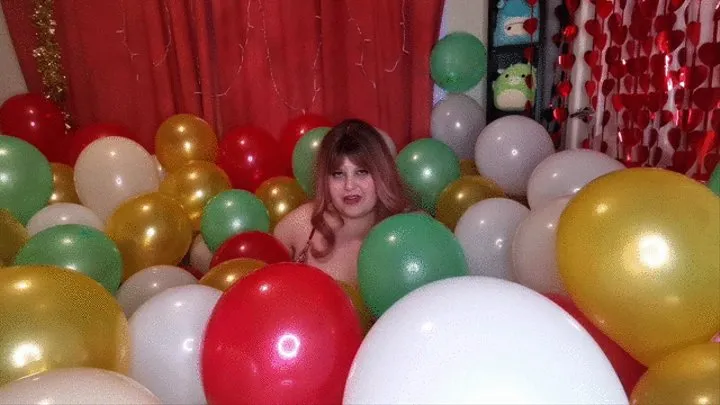 JOI surrounded by balloons