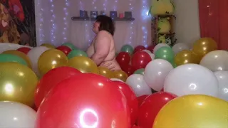 Riding cock in a sea of latex balloons