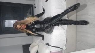 Dominatrix rubber Doll subdues slave girl