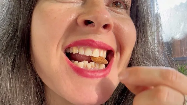 hard nuts crushed by her strong teeth m2