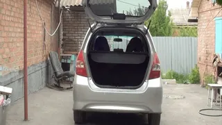cleaning my car with blue vacuum