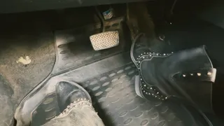 driving a car in leather cowboy boots