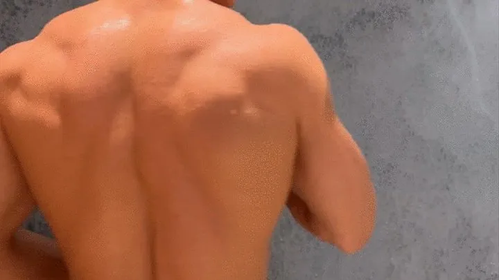 Muscular back shower scene