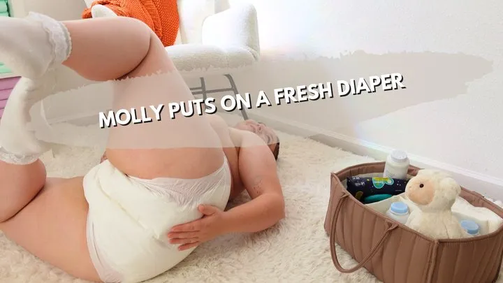 Molly Changes Into A Fresh Diaper