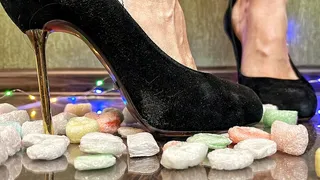 Seductive stilettos: crushing crunchy spheres with passion!