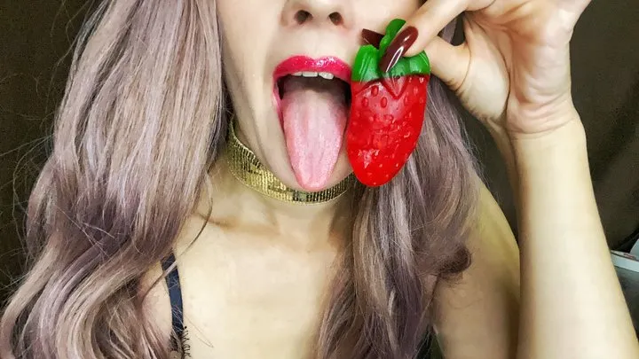 Cute fairy found a berry in the form of a tongue