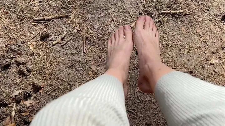 her naked feet are further discovering hard wood