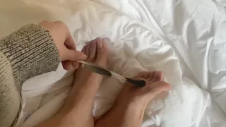 feather stroking venus naked feet