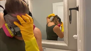 GLOVED AND MASK BATHROOM CLEANING