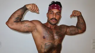 Tattoed male flexing and posing - Lalo Cortez