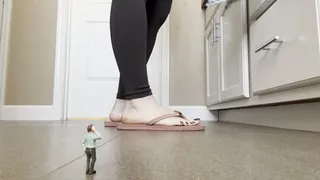 Giantess Dominates Tiny Man Under Her Feet