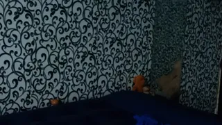 girl play on airmatress with balloons and gloves