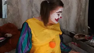 clown girl blowing punchballoon