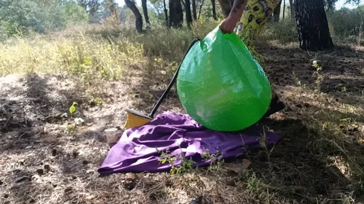 blow with feet pump gymball in forest