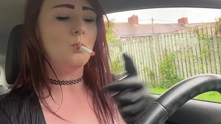 Smoking in the car with jasmine silk leather gloves on