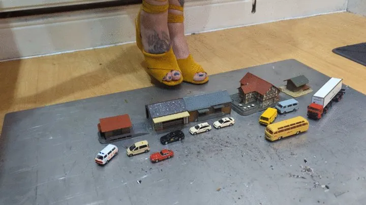 Giantess Atari queen destroys tiny cars buses and buildings toy car crush in sexy yellow wedges close up left view