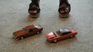 Giantess Charlene destroys and crush 2 plastic toy cars in sexy wedges close up view