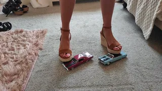 Giantess Charn vs 2 1969 Plymouths toy car crush in sexy brown wedges with painted toenails ground view