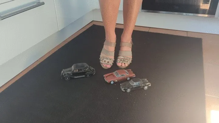 Raven Lee Crushes 3 hand built plastic classic cars in sexy heels with painted toenails high view