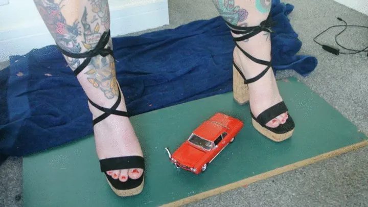 Giantess Jayne toy car crush a 1964 Pontiac GTO in chunky lacey heels close left high view