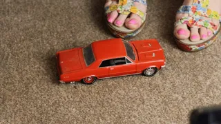 Abby completely destroys a 1964 Pontiac GTO in summer wedges, close up (bad quality as camera was moving)