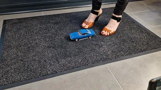 Abby Giantess toy car crush a 1969 Chevrolet Camaro in open toe heels upper view