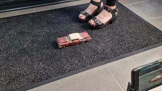 Abby Giantess toy car crush 1960s Cadillac Junker in black platform high heels upper view