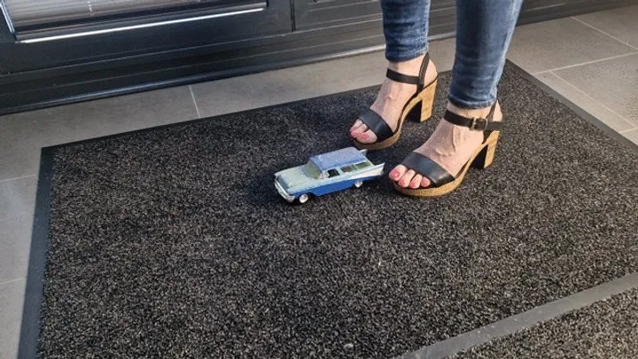 Abby Giantess crush a toy car 1955 Chevy Nomad in high heel sandals upper side view