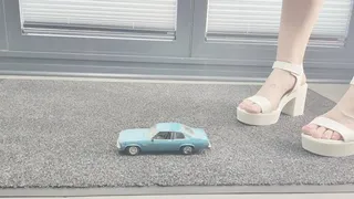 Abby giantess crush toy car Chevy Nova in sexy white chunky heels low side view