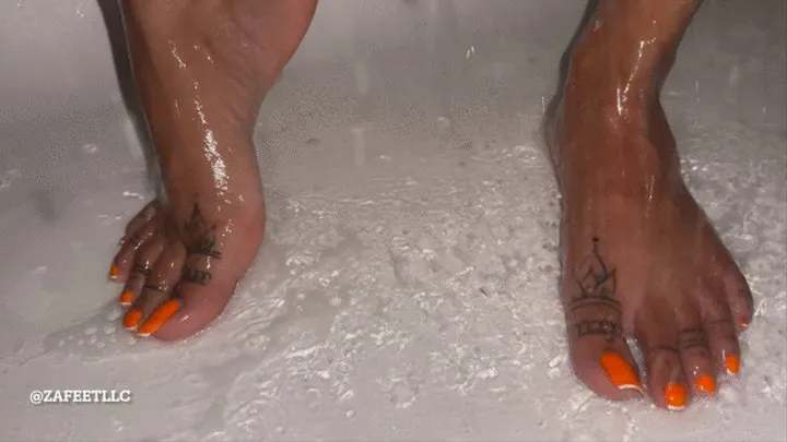 " Shower feet n orange toes"