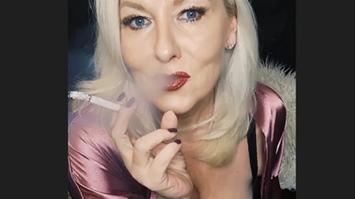 Smoker MILF wrapped in beautiful pink satin sucks her cork powerfully