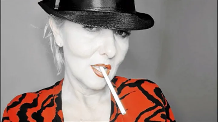 Smoker Queen Joan takes a pleasurable drag on her 120 Eve, many open mouth inhalations with lots of creamy white smoke surrounding her red lips*hat fetisch*red lips*close up*special filter*