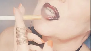 Your goddess Smokerqueenjoan smoking provocatively with many OMI's her Marlboro Red 100*cough*naked tits*black red lipstick