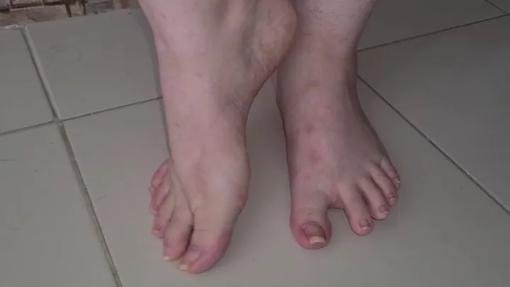 Big feet walking barefoot slowly