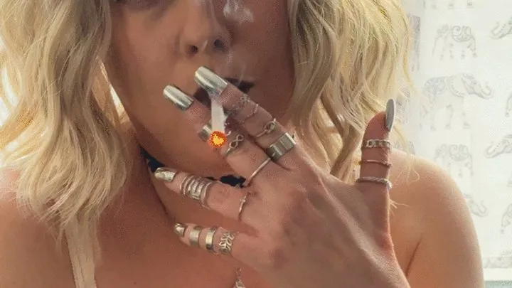 Smoking, hand and nails fetish, with lots of rings