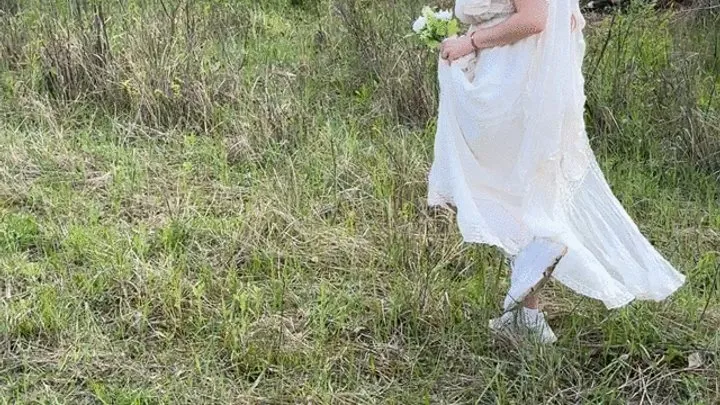 Bride sneaking up for a smoke break at her wedding - voyeur style capture