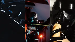 Tied up rubber girl in catsuit fucking herself