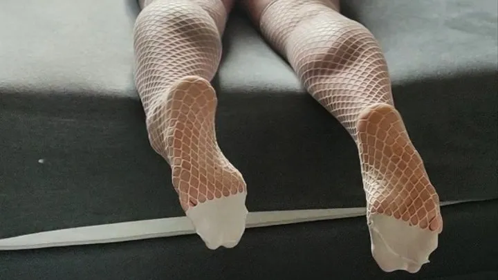 Giant Legs in Fishnet Stockings