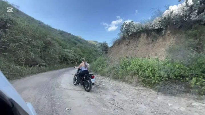 Jarlyn drives the motorcycle in the unstable terrain