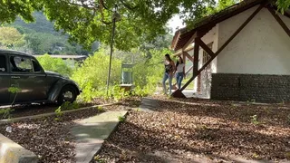 Jarlyn tries to skate the tire in the puddle