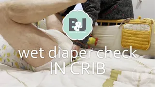 Wet diaper check in crib