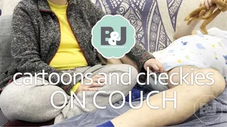 Cartoons and checkies on couch