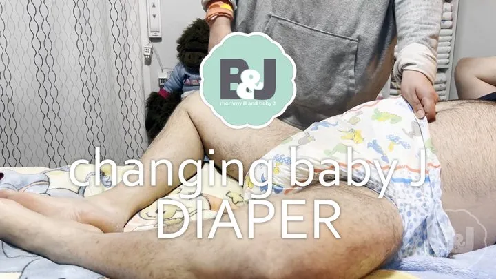 Changing baby J diaper